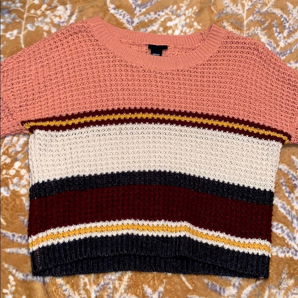 It’s a cropped sweater